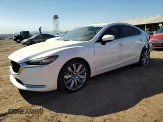 2021 Mazda 6 Signature with VIN JM1GL1XY5M1614601, listed as a Copart auction lot 73769893 with 22,617 mi miles and . Bid and sale history available at DreamBid. Image 1.