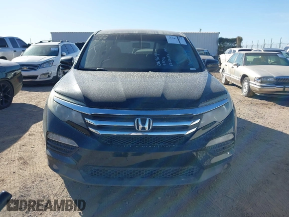 2017 Honda Pilot EX-L with VIN 5FNYF6H54HB063619, listed as a IAAI auction lot 41545415 with Not Provided miles and . Bid and sale history available at DreamBid. Image 11.