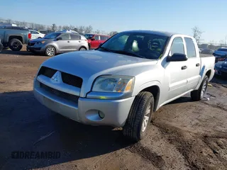 2006 Mitsubishi Raider LS with VIN 1Z7HT28K86S580062, listed as a IAAI auction lot 41766477 with 255,704 mi miles. Bid and sale history available at carsss.com. Image 2.
