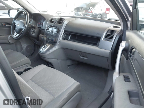 2007 Honda CR-V EX with VIN JHLRE38557C069515, listed as a IAAI auction lot 42121504 with 153,971 mi miles and . Bid and sale history available at carsss.com. Image 5.