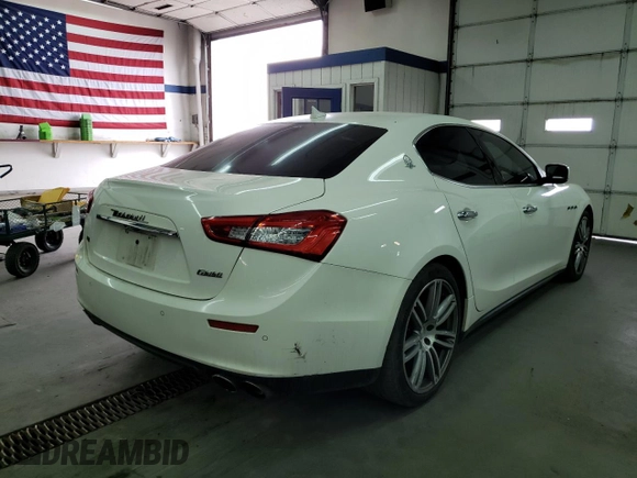 2015 Maserati Ghibli S Q4 with VIN ZAM57RTA8F1153413, listed as a Copart auction lot 42152062 with 54,884 mi miles. Bid and sale history available at carsss.com. Image 4.