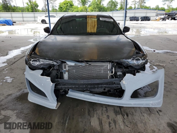 2014 Subaru BRZ Limited с VIN JF1ZCAC14E9601722, выставлен на аукционе Copart как лот 56002685 с пробегом 76 859 миль миль и Списание • Salvage title. История ставок и продаж доступна на DreamBid. Изображение 5.