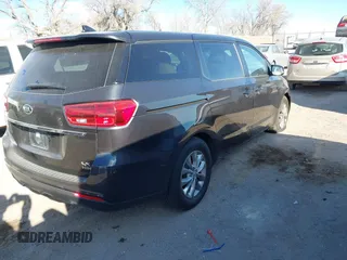 2021 Kia Sedona EX with VIN KNDMB5C19M6671229, listed as a IAAI auction lot 41066675 with 168,393 mi miles. Bid and sale history available at carsss.com. Image 4.