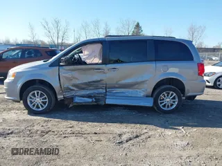 2014 Dodge Grand Caravan SXT 30th Anniversary with VIN 2C4RDGCG3ER119994, listed as a IAAI auction lot 42062017 with 96,909 mi miles and . Bid and sale history available at DreamBid. Image 14.
