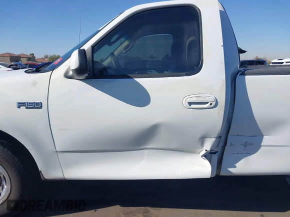 2003 Ford F-150 XL with VIN 1FTRF17293NA46808, listed as a IAAI auction lot 41156923 with 384,475 mi miles and . Bid and sale history available at DreamBid. Image 14.