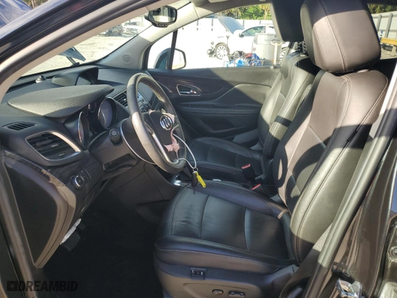 2016 Buick Encore Leather with VIN KL4CJGSBXGB712834, listed as a Copart auction lot 85512614 with 88,298 mi miles and Salvage Title. Bid and sale history available at carsss.com. Image 7.