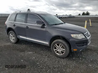 2008 Volkswagen Touareg V6 z VIN WVGBE77LX8D000610, wystawiony jako Copart lot #58434065 z przebiegiem 208 718 mil mil oraz Czysty tytuł • Clean title. Historia ofert i sprzedaży dostępna na DreamBid. Obrazek 4.