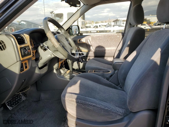 2001 Isuzu Rodeo S with VIN 4S2CK58W814333364, listed as a Copart auction lot 84656114 with 140,489 mi miles and Salvage Title. Bid and sale history available at carsss.com. Image 7.
