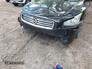 2013 Nissan Maxima S with VIN 1N4AA5AP0DC828375, listed as a IAAI auction lot 42215336 with 210,398 mi miles and . Bid and sale history available at DreamBid. Image 6.