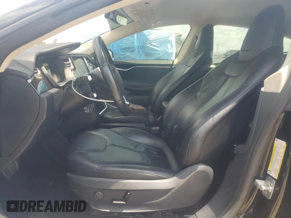 2014 Tesla Model S 60 with VIN 5YJSA1S16EFP50982, listed as a Copart auction lot 54426015 with 76,515 mi miles and Salvage title. Bid and sale history available at DreamBid. Image 7.
