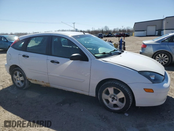 2004 Ford Focus with VIN 3FAFP37Z74R121213, listed as a Copart auction lot 53339645 with 65,590 mi miles and Clean title. Bid and sale history available at DreamBid. Image 4.