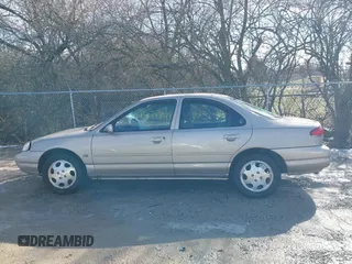1999 Mercury Mystique GS z VIN 1MEFM6530XK635463, wystawiony jako IAAI lot #41478903 z przebiegiem 87 911 mil mil oraz . Historia ofert i sprzedaży dostępna na DreamBid. Obrazek 14.