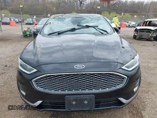 2020 Ford Fusion Titanium with VIN 3FA6P0D9XLR174523, listed as a IAAI auction lot 42100113 with 100,602 mi miles and . Bid and sale history available at DreamBid. Image 13.