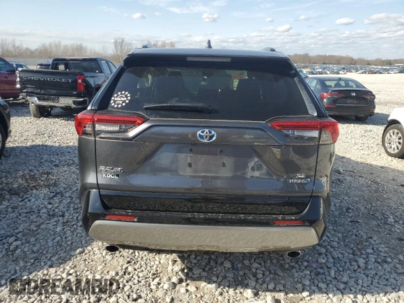2024 Toyota RAV4 Hybrid SE with VIN JTM16RFV4RD123719, listed as a Copart auction lot 52952275 with 26,394 mi miles and Salvage title. Bid and sale history available at DreamBid. Image 6.