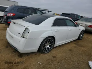 2013 Chrysler 300 SRT-8 with VIN 2C3CCAFJ7DH567824, listed as a Copart auction lot 89155475 with 147,159 mi miles and Salvage Title. Bid and sale history available at DreamBid. Image 3.