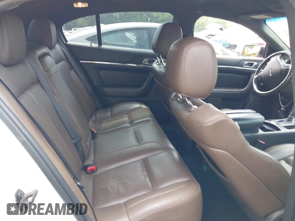 2013 Lincoln MKS with VIN 1LNHL9DK6DG600928, listed as a IAAI auction lot 42502424 with 194,015 mi miles and . Bid and sale history available at DreamBid. Image 8.