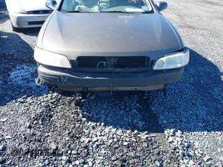 2000 Nissan Altima XE with VIN 1N4DL01D0YC181174, listed as a IAAI auction lot 41798721 with 119,682 mi miles. Bid and sale history available at carsss.com. Image 6.