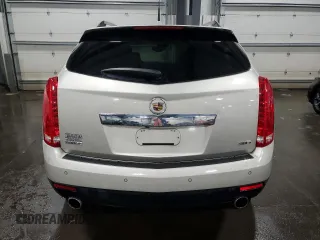 2014 Cadillac SRX Premium Collection с VIN 3GYFNDE3XES611363, выставлен на аукционе Copart как лот 50643475 с пробегом 57 749 миль миль и Списание • Salvage title. История ставок и продаж доступна на DreamBid. Изображение 6.