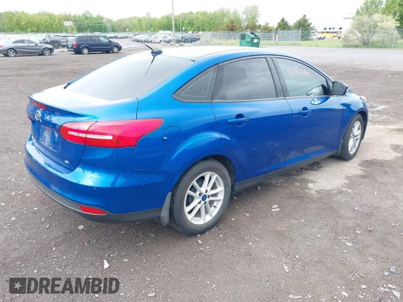 2018 Ford Focus SE z VIN 1FADP3F29JL235302, wystawiony jako IAAI lot #42262964 z przebiegiem 85 127 mil mil oraz . Historia ofert i sprzedaży dostępna na DreamBid. Obrazek 4.