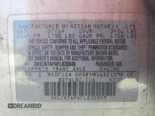 2015 Nissan Versa SV z VIN 3N1CN7AP4FL835049, wystawiony jako Copart lot #56591975 z przebiegiem 153 724 mil mil oraz Szkoda całkowita • Salvage title. Historia ofert i sprzedaży dostępna na DreamBid. Obrazek 12.
