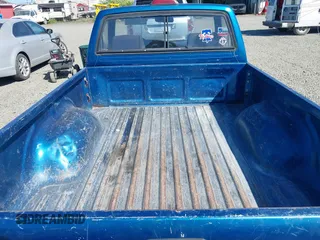 1994 Toyota Pickup z VIN 4TARN81A8RZ196014, wystawiony jako IAAI lot #42356847 z przebiegiem 165 291 mil mil oraz . Historia ofert i sprzedaży dostępna na DreamBid. Obrazek 8.