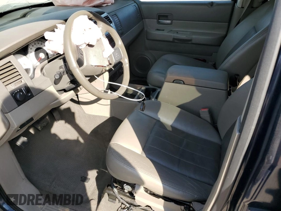 2004 Dodge Durango Limited with VIN 1D4HD58N44F137047, listed as a Copart auction lot 75627074 with 199,876 mi miles and Salvage title. Bid and sale history available at DreamBid. Image 7.