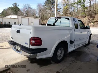 1997 Ford F-150 z VIN 1FTDX0766VKA86983, wystawiony jako Copart lot #50896215 z przebiegiem 214 746 mil mil oraz Szkoda całkowita • Salvage title. Historia ofert i sprzedaży dostępna na DreamBid. Obrazek 3.