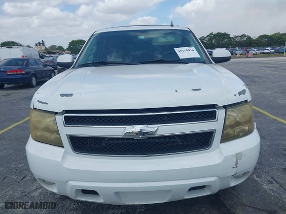 2009 Chevrolet Suburban LT w/2LT with VIN 1GNFC26JX9J108623, listed as a IAAI auction lot 42115456 with 144,370 mi miles. Bid and sale history available at carsss.com. Image 6.