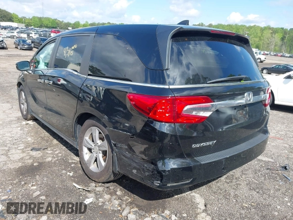 2018 Honda Odyssey EX-L with VIN 5FNRL6H75JB065206, listed as a IAAI auction lot 42009227 with 133,652 mi miles. Bid and sale history available at carsss.com. Image 3.