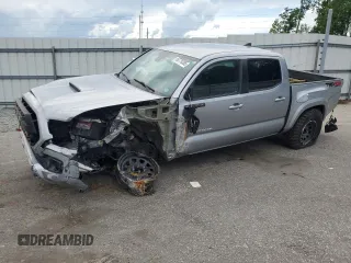2019 Toyota Tacoma SR with VIN 3TMCZ5AN2KM193701, listed as a Copart auction lot 56776385 with 112,990 mi miles and Salvage title. Bid and sale history available at DreamBid. Image 1.
