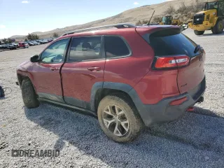 2014 Jeep Cherokee Trailhawk with VIN 1C4PJMBS7EW157305, listed as a Copart auction lot 49436685 with 138,446 mi miles and Salvage Title. Bid and sale history available at carsss.com. Image 2.