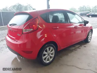 2012 Ford Fiesta SE with VIN 3FADP4EJ4CM215670, listed as a IAAI auction lot 41980900 with 87,874 mi miles. Bid and sale history available at carsss.com. Image 4.