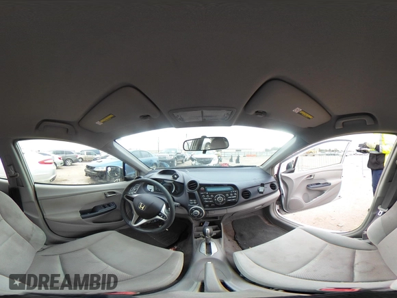 2010 Honda Insight EX with VIN JHMZE2H71AS035091, listed as a IAAI auction lot 41380128 with 181,653 mi miles and . Bid and sale history available at DreamBid. Image 19.