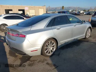 2014 Lincoln MKZ with VIN 3LN6L2G9XER824799, listed as a IAAI auction lot 41472656 with 148,582 mi miles. Bid and sale history available at carsss.com. Image 4.