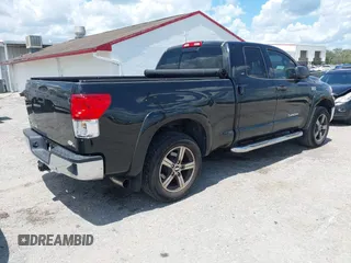 2012 Toyota Tundra z VIN 5TFRY5F17CX128888, wystawiony jako IAAI lot #42508395 z przebiegiem 279 524 mil mil oraz . Historia ofert i sprzedaży dostępna na DreamBid. Obrazek 4.