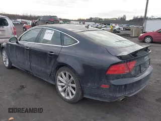 2014 Audi A7 3.0 Prestige with VIN WAU2GAFC5EN071911, listed as a IAAI auction lot 41453159 with 120,569 mi miles. Bid and sale history available at carsss.com. Image 3.