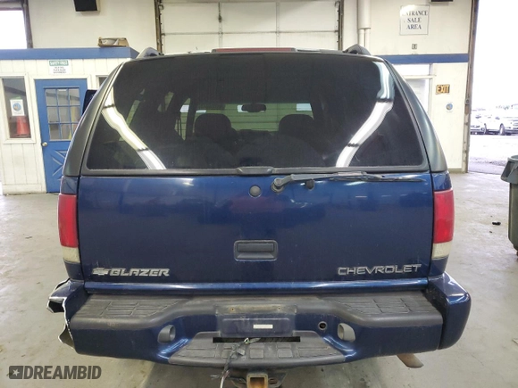2000 Chevrolet Blazer LT with VIN 1GNDT13W6Y2372092, listed as a Copart auction lot 85784644 with 128,379 mi miles and Salvage Title. Bid and sale history available at carsss.com. Image 6.