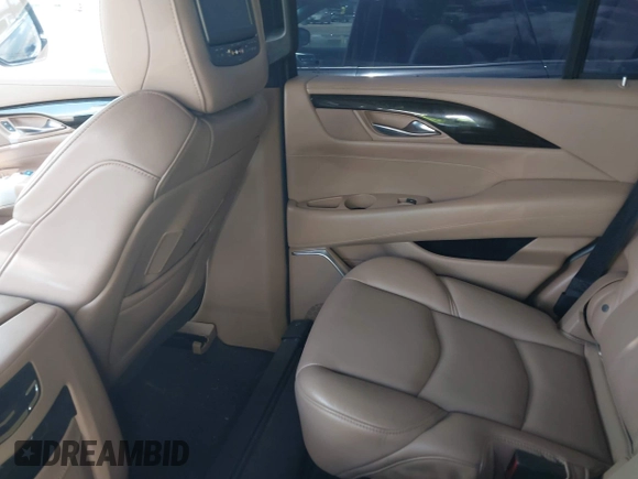2019 Cadillac Escalade Platinum with VIN 1GYS4DKJ9KR138333, listed as a IAAI auction lot 42523430 with 104,787 mi miles and . Bid and sale history available at DreamBid. Image 8.