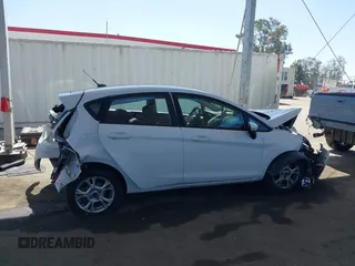 2014 Ford Fiesta SE z VIN 3FADP4EJ4EM117919, wystawiony jako IAAI lot #42262361 z przebiegiem 121 141 mil mil oraz . Historia ofert i sprzedaży dostępna na DreamBid. Obrazek 13.