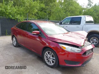 2016 Ford Focus SE z VIN 1FADP3F28GL361028, wystawiony jako IAAI lot #42573031 z przebiegiem 114 342 mil mil oraz . Historia ofert i sprzedaży dostępna na DreamBid. Obrazek 1.