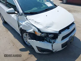 2016 Chevrolet Sonic LS with VIN 1G1JA6SH1G4112485, listed as a IAAI auction lot 40074350 with 139,496 mi miles and . Bid and sale history available at DreamBid. Image 6.