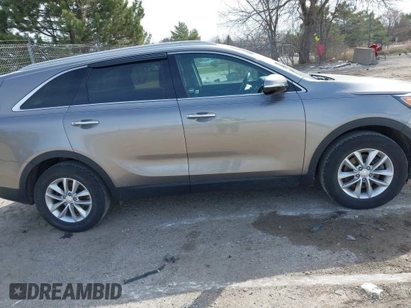 2017 Kia Sorento LX with VIN 5XYPG4A3XHG297598, listed as a IAAI auction lot 42029607 with 104,157 mi miles. Bid and sale history available at carsss.com. Image 13.