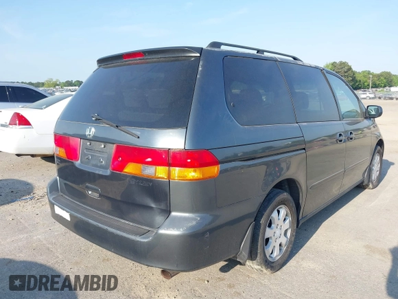 2003 Honda Odyssey EX with VIN 5FNRL18673B112958, listed as a IAAI auction lot 42172282 with 189,521 mi miles and . Bid and sale history available at DreamBid. Image 4.