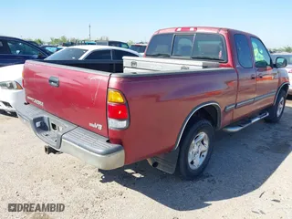 2002 Toyota Tundra SR5 with VIN 5TBRT34142S259456, listed as a IAAI auction lot 41872370 with 256,850 mi miles. Bid and sale history available at carsss.com. Image 4.