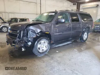 2011 Chevrolet Suburban LT with VIN 1GNSKJE32BR320339, listed as a Copart auction lot 57060555 with 276,581 mi miles and Salvage title. Bid and sale history available at DreamBid. Image 1.