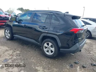 2019 Toyota RAV4 XLE with VIN 2T3W1RFV8KW001328, listed as a IAAI auction lot 41961320 with 100,678 mi miles and . Bid and sale history available at DreamBid. Image 3.
