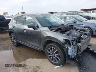 2018 Mazda CX-5 Grand Touring with VIN JM3KFBDM8J0441867, listed as a IAAI auction lot 41565147 with 62,466 mi miles. Bid and sale history available at carsss.com. Image 1.