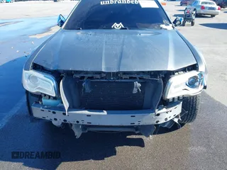 2011 Chrysler 300 with VIN 2C3CA6CTXBH563112, listed as a IAAI auction lot 41374372 with 151,947 mi miles. Bid and sale history available at carsss.com. Image 6.