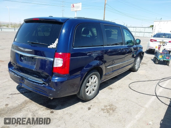 2014 Chrysler Town & Country Touring with VIN 2C4RC1BGXER131707, listed as a IAAI auction lot 42017348 with 120,790 mi miles and . Bid and sale history available at DreamBid. Image 4.