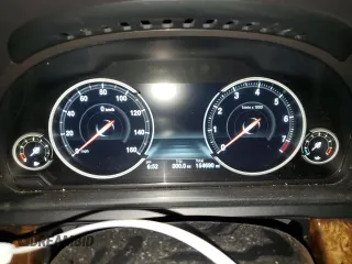 2014 BMW 7 Series 740Li with VIN WBAYE4C57ED138408, listed as a Copart auction lot 80553304 with 154,690 mi miles and Salvage Title. Bid and sale history available at carsss.com. Image 9.